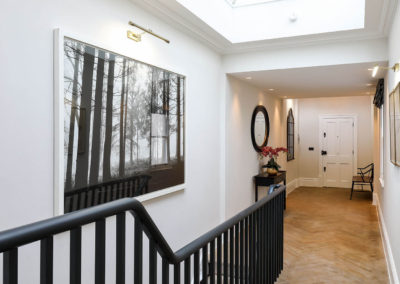 Penman Interiors Chelsea Hallway Parquet Flooring Black Stair-case Monochrome Art