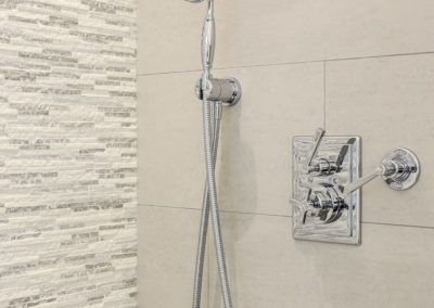 Penman Interiors Chelsea Homes Shower Neutral Stone Tiles