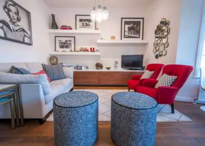 Penman Interiors Chiswick Living Space Open Plan Footstools Monochromatic Black White Photography Red Accents