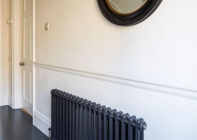 Penman Interiors West Dulwich Cast Iron Radiator Black Painted Floor